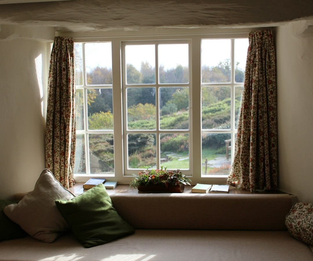 Home maintenance guide photograph 2 window curtain open wide