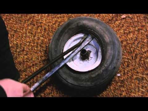 Remove and install lawn mower tire with hand tools - Handyman Problem Fixer